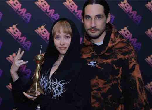 Madge and Povoa at BMVA 2026 holding the award